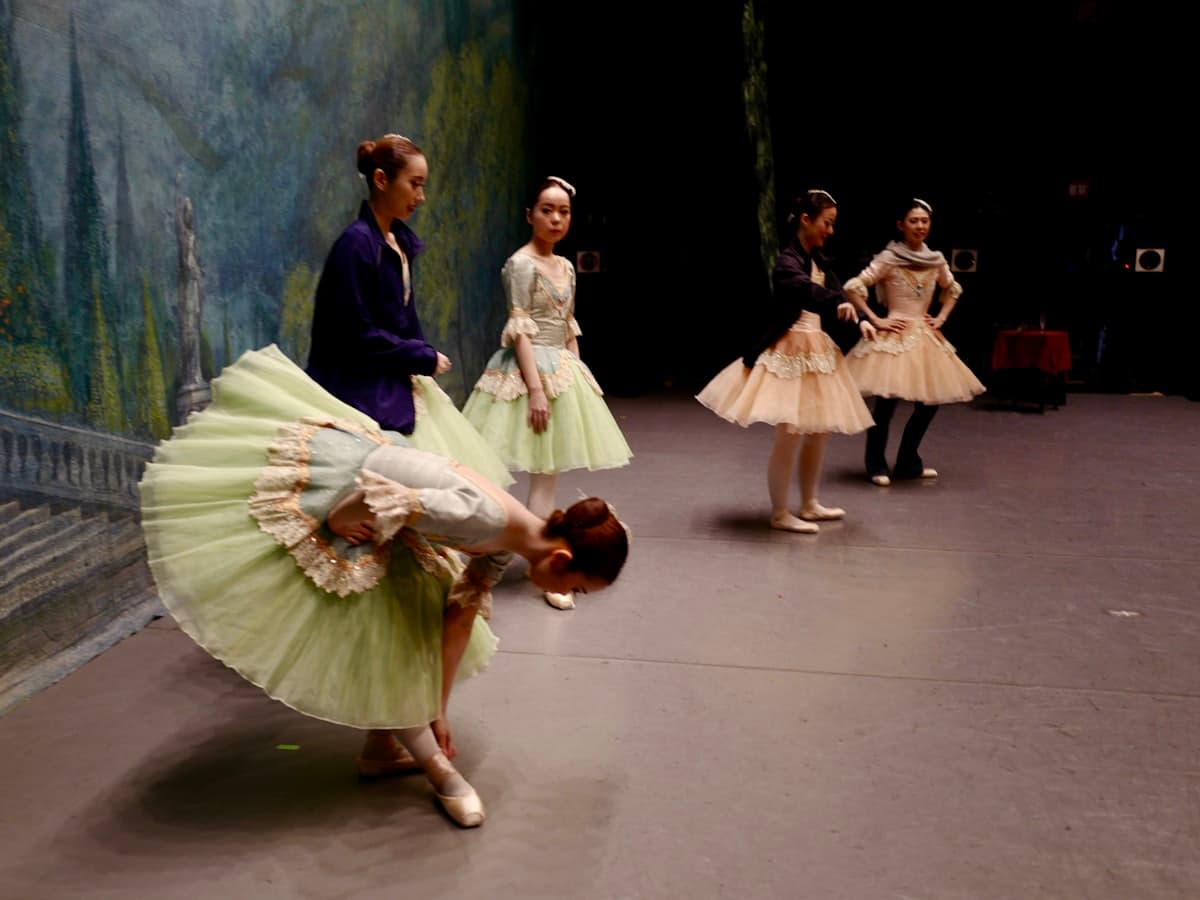 Young ballet dancers rehearsing in a studio